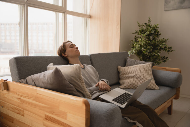 Canva - Photo Of Man Sleeping On Sofa