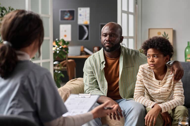 Parent and child in counselling together as support for someone who has an addiction