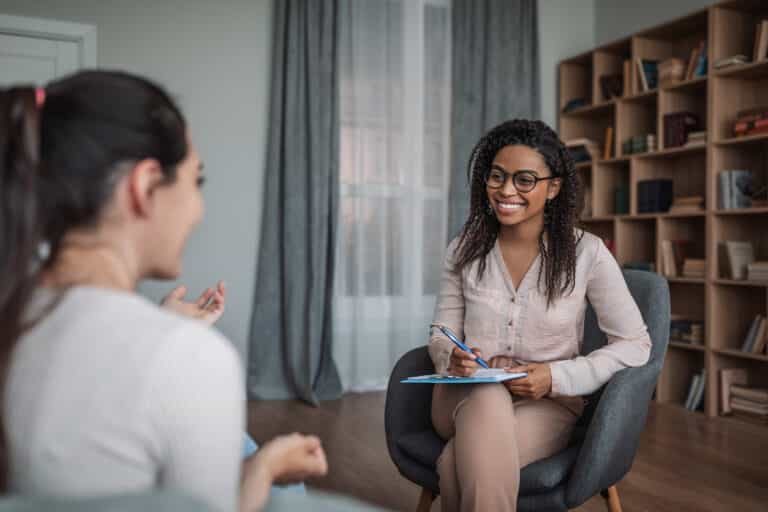 Registered Counsellor smiling at client