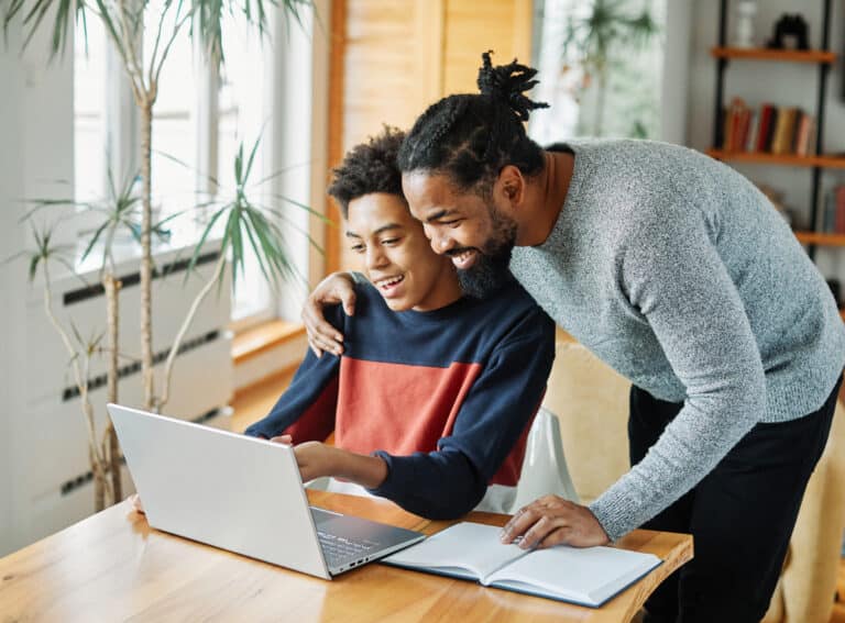 father child home family study son teenage parent education laptop teen boy teaching childhood man learning together school computer internet teacher tutor black